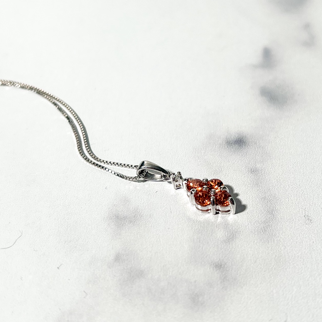 1.15ctw Round Mandarin Garnet & .02ctw White Zircon Sterling Silver Pendant